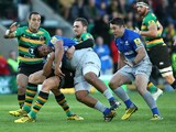  Mako Vunipola of Saraces is tackled by George North during the Aviva Premiership match between Northampton Saints and Saracens at Franklin's Gardens on November 7, 2015 in Northampton, England.