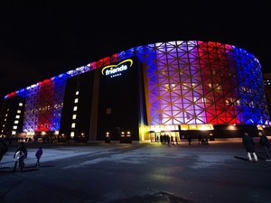 The Friends arena in Solna near Stockholm is lit with national colours of France ahead the Euro 2016 play-off football match between Sweden and Denmark on November 14, 2015.
