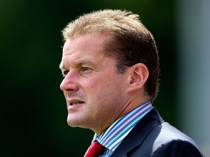 Stevenage manager Graham Westley looks on prior to the Pre Season Friendly match between Stevenage and West Ham United at The Lamex Stadium on July 12, 2014