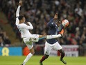 England's midfielder Dele Alli (L) vies against France's midfielder Blaise Matuidi during the friendly football match between England and France at Wembley Stadium in west London on November 17, 2015