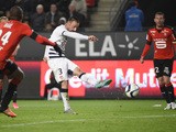 Bordeaux's German defender Diego Contento (C) scores a goal during the French L1 football match Rennes against Bordeaux on November 22, 2015