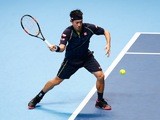 Kei Nishikori plays a shot during his group-stage match against Tomas Berdych at the ATP World Tour Finals in London on November 17, 2015