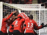 Rennes' French forward Ousmane Dembele (top) celebrates after scoring during the French L1 football match Rennes against Bordeaux on November 22, 2015 at the route de Lorient stadium in Rennes, western France.