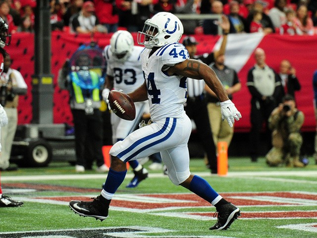 Ahmad Bradshaw #44 of the Indianapolis Colts celebrates a touchdown during the first half against the Atlanta Falcons at the Georgia Dome on November 22, 2015