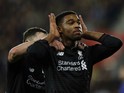 Liverpool's English midfielder Jordon Ibe (R) celebrates after scoring his team's fifth goal during the English League Cup quarter-final football match between Southampton and Liverpool at St Mary's Stadium in Southampton, southern England on December 2, 