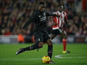 Liverpool's Belgian striker Daniel Origi shoots to score his team's fourth goal during the English League Cup quarter-final football match between Southampton and Liverpool at St Mary's Stadium in Southampton, southern England on December 2, 2015. 