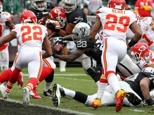 Latavius Murray #28 of the Oakland Raiders dives for a touchdown against the Kansas City Chiefs during their NFL game at O.co Coliseum on December 6, 2015