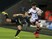 Bordeaux-Begles' French centre Felix Le Bourhis (R) fends off a tackle by Ospreys' South African center Hanno Dirksen (L) during the European Rugby Champions Cup pool rugby union match between Ospreys and Bordeaux-Begles at Liberty Stadium in Swansea, Sou