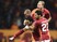 Galatasaray's Turkish midfielder and captain Selcuk Inan (L) celebrates with teammates after scoring a goal during the UEFA Champions League Group C football match between Galatasaray AS and FC Astana at the Turk Telekom Arena in Istanbul on December 8, 2