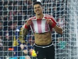 Jose Fonte reveals a flawless six-pac after scoring for Southampton against Arsenal on December 26, 2015
