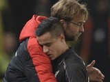 Philippe Coutinho receives a hug from manager Jurgen Klopp after coming off during the League Cup semi-final between Stoke and Liverpool on January 5, 2016