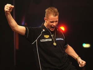 Wesley Harms of Netherlands reacts on day one of the BDO Lakeside World Professional Darts Championships at Lakeside Complex on January 4, 2014