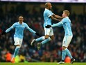 Fabian Delph celebrates with little Kevin de Bruyne during the game between Man City and Crystal Palace on January 16, 2016