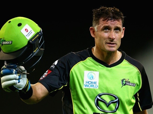 Michael Hussey walks off after being dismissed by Adam Zampa during the Big Bash League final match between Melbourne Stars and the Sydney Thunder at Melbourne Cricket Ground on January 24, 2016