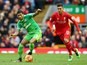 Patrick van Aanholt and Roberto Firmino in action during the Premier League game between Liverpool and Sunderland on February 6, 2016