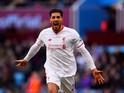 Emre Can celebrates scoring during the Premier League game between Aston Villa and Liverpool on February 14, 2016