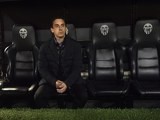 Gary Neville sits in the dugout during the Copa del Rey semi between Valencia and Barcelona on February 10, 2016