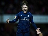 Luka Modric celebrates scoring during the La Liga match between Granada  and Real Madrid on February 7, 2016