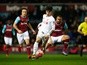 Joao Teixeira evades Mark Noble and Winston Reid during the FA Cup fourth-round replay between West Ham United and Liverpool  on February 9, 2016 