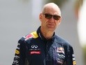 Red Bull chief technical officer Adrian Newey walks into the paddock during final practice for the Bahrain Grand Prix on April 18, 2015