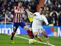 Gabi and Isco in action during the La Liga game between Real Madrid and Atletico Madrid on February 27, 2016