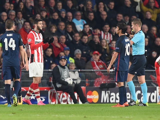 PSV Eindhoven's Gaston Pereiro is sent off during the Champions League last-16 first leg against Atletico Madrid on February 24, 2016