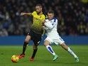 Jamie Vardy tussles with Mario Suarez during the Premier League game between Watford and Leicester City on March 5, 2016