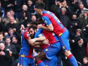 Joe Ledley celebrates with teammates after scoring during the Premier League game between Crystal Palace and Liverpool on March 6, 2016