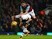 Aaron Cresswell of West Ham United mounts Erik Lamela of Tottenham Hotspur on March 2, 2016