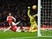 Joel Campbell scores the opening goal during the Premier League match between Arsenal and Swansea City at the Emirates Stadium on March 2, 2016