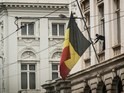 The Belgian flag flies at half mast following the Brussels attacks on March 23, 2016