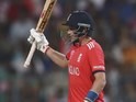Joe Root celebrates his half century during the World Twenty20 final between England and the West Indies at Eden Gardens on April 3, 2016