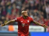 Arturo Vidal celebrates scoring during the Champions League quarter-final between Bayern Munich and Benfica on April 5, 2016