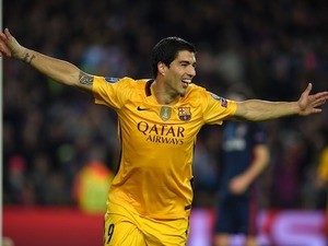 Luis Suarez celebrates scoring again during the Champions League quarter-final between Barcelona and Atletico Madrid on April 5, 2016