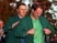 Jordan Spieth hands Danny Willett his green jacket at The Masters on April 10, 2016