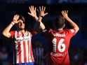 Angel Correa celebrates with Saul Niguez during the La Liga game between Atletico Madrid and Brentford on April 17, 2016