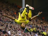 Pierre-Emerick Aubameyang celebrates scoring the second during the Europa League quarter-final between Liverpool and Borussia Dortmund on April 14, 2016