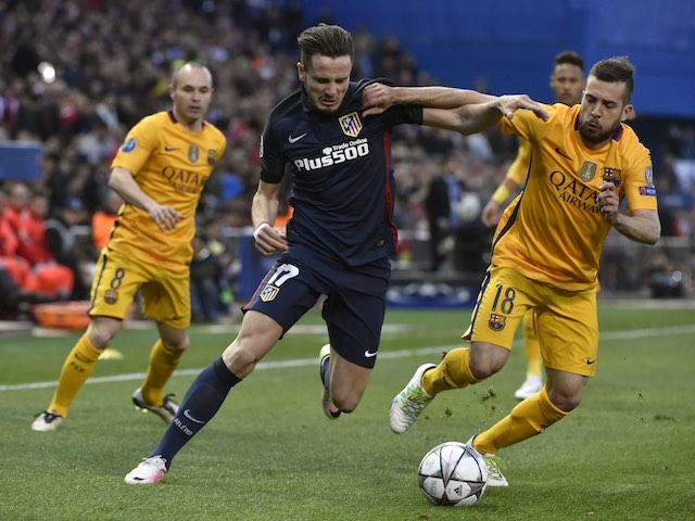 Saul Niguez and Jordi Alba in action during the Champions League quarter-final between Atletico Madrid and Barcelona on April 13, 2016
