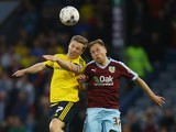 Grant Leadbitter and Scott Arfield contest an aerial duel in the Championship match between Burnley and MIddlesbrough at Turf Moor on April 19, 2016