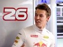 Daniil Kvyat of Red Bull Racing gets ready in the garage during practice for the Formula One Grand Prix of Russia at Sochi Autodrom on April 29, 2016