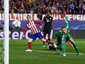Atletico Madrid striker Fernando Torres hits the post during his side's Champions League semi-final first leg against Bayern Munich at the Vicente Calderon on April 27, 2016