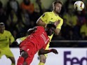 Kolo Toure shows Roberto Soldado his gravity shoes during the Europa League semi-final between Villarreal and Liverpool on April 28, 2016