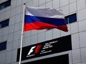 The Russian flag flies in the paddock during previews ahead of the Formula One Grand Prix of Russia at Sochi Autodrom on April 28, 2016