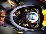 Daniel Ricciardo sits in his Red Bull-TAG Heuer RB12 fitted with the aeroscreen during previews ahead of the Formula One Grand Prix of Russia at Sochi Autodrom on April 28, 2016
