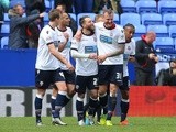 Stephen Dobbie of Bolton Wanderers celebrates scoring his team's first goal during the Championship match against Hull City at the Macron Stadium on April 30, 2016