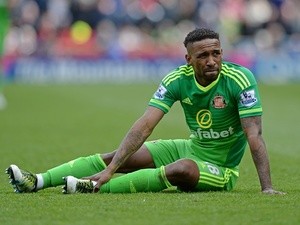 Jermain Defoe lies injured during the Premier League match between Stoke City and Sunderland on April 30, 2016