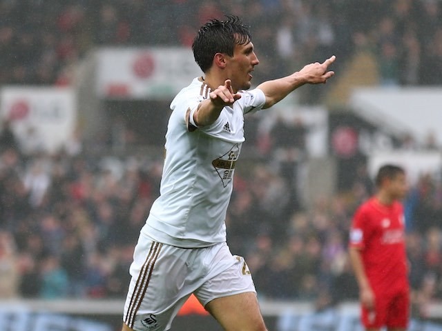 Big boy Jack Cork celebrates scoring during the Premier League game between Swansea City and Liverpool on May 1, 2016