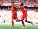 Roberto Firmino celebrates with Sheyi Ojo during the Premier League game between Liverpool and Watford on May 8, 2016