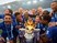 Leicester City players celebrate with the Premier League trophy on May 8, 2016