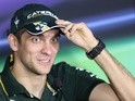 Vitaly Petrov speaks during a press conference at the Yas Marina circuit on November 1, 2012